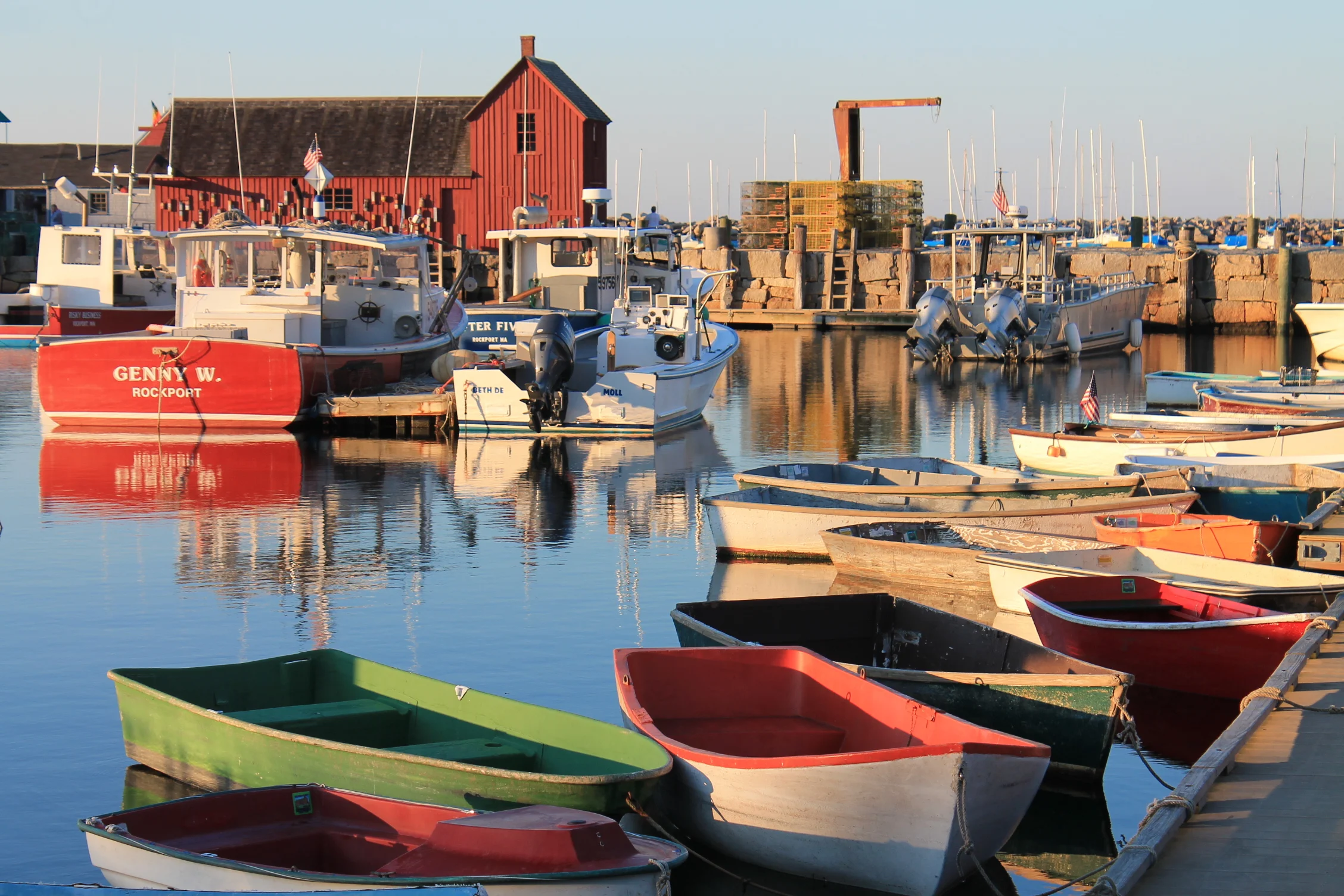 Boats parked in the harbor